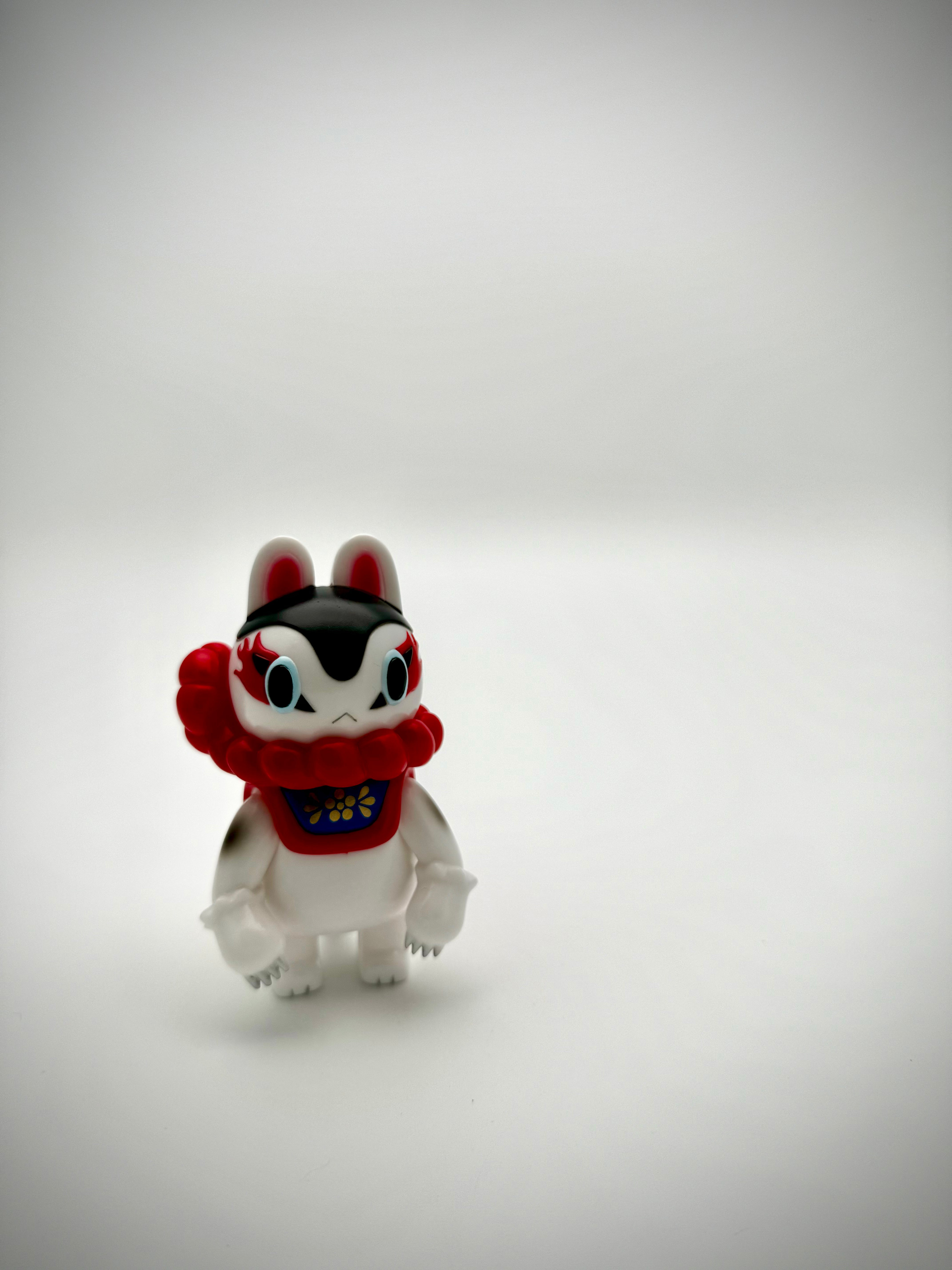 Sofubi toy: small animal figure with cartoon style, inspired by INU-HARIGON Classic White by TERESA CHIBA.