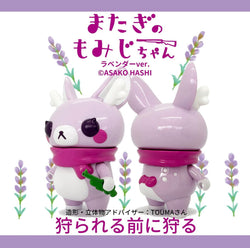 A close-up of Momiji-chan Lavender Ver. figurine by Asako Hashi, a toy deer with a soft vinyl doll resembling her.