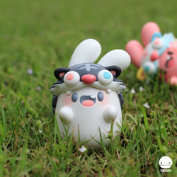 Ngaew ngaew The black tiger toy in grass, with other toys. Limited edition resin, 8cm size.