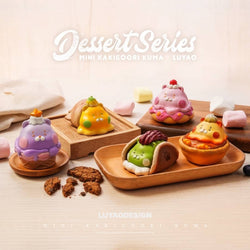 Mini Kakigoori Kuma dessert blind box series: small toys on wooden surface, in taco shell, on plate, in bowl, and close-up cookie.