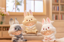 YUMO Stay With You Blind Box Series featuring bunny figurines; includes 12 designs with potential secret editions, displayed in an art toy store setting.