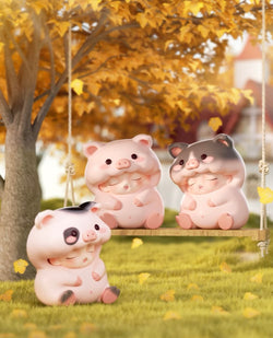 YUMO Stay With You Blind Box Series featuring pig figurines on a swing, offering 12 regular and secret designs.