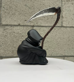 A limited edition Grim Ideas - The Lone Reaper resin toy by Riser, standing 7 tall. Features a grim reaper figure in a black robe. From Strangecat Toys.