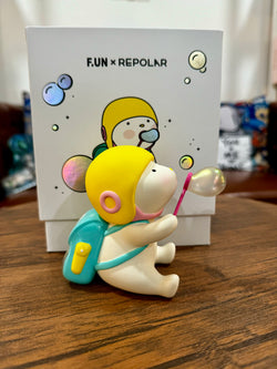 A blind box and art toy store presents Repolar 150% blow bubbles figurine. Monkey toy with bubble, backpack detail, 5-inch PVC. Limited edition, 1001 pieces.