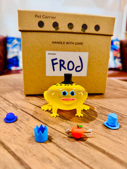 Poison Dart Frod by Sad Salesman: A 9cm resin toy featuring a yellow frog with interchangeable hats, limited edition of 100 pieces.