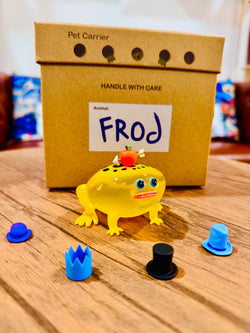 Poison Dart Frod by Sad Salesman, a 9cm resin toy, shown with interchangeable PVC hats in a limited edition of 100 pieces.