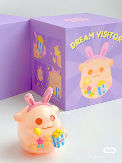 An art toy featuring ShinWoo-150% eat your dreams, a rabbit cartoon character with a popcorn container. Soft vinyl material, 7.3cm size.