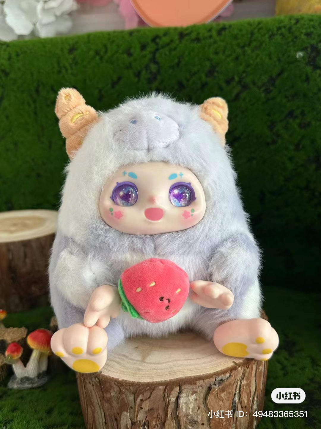 Blind box series preorder: O'CHICHI Return of The Wild. Stuffed animal toy on stump with strawberry, doll close-up, and plush strawberry detail. From Strangecat Toys.