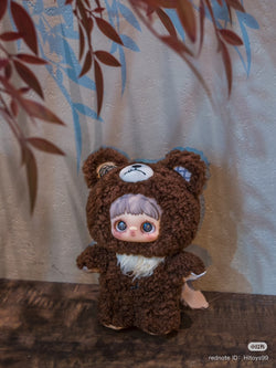 Maymei Dark Forest Plush Blind Box Series toy, featuring a stuffed animal doll in a bear garment, part of a collectible series with regular and secret designs.