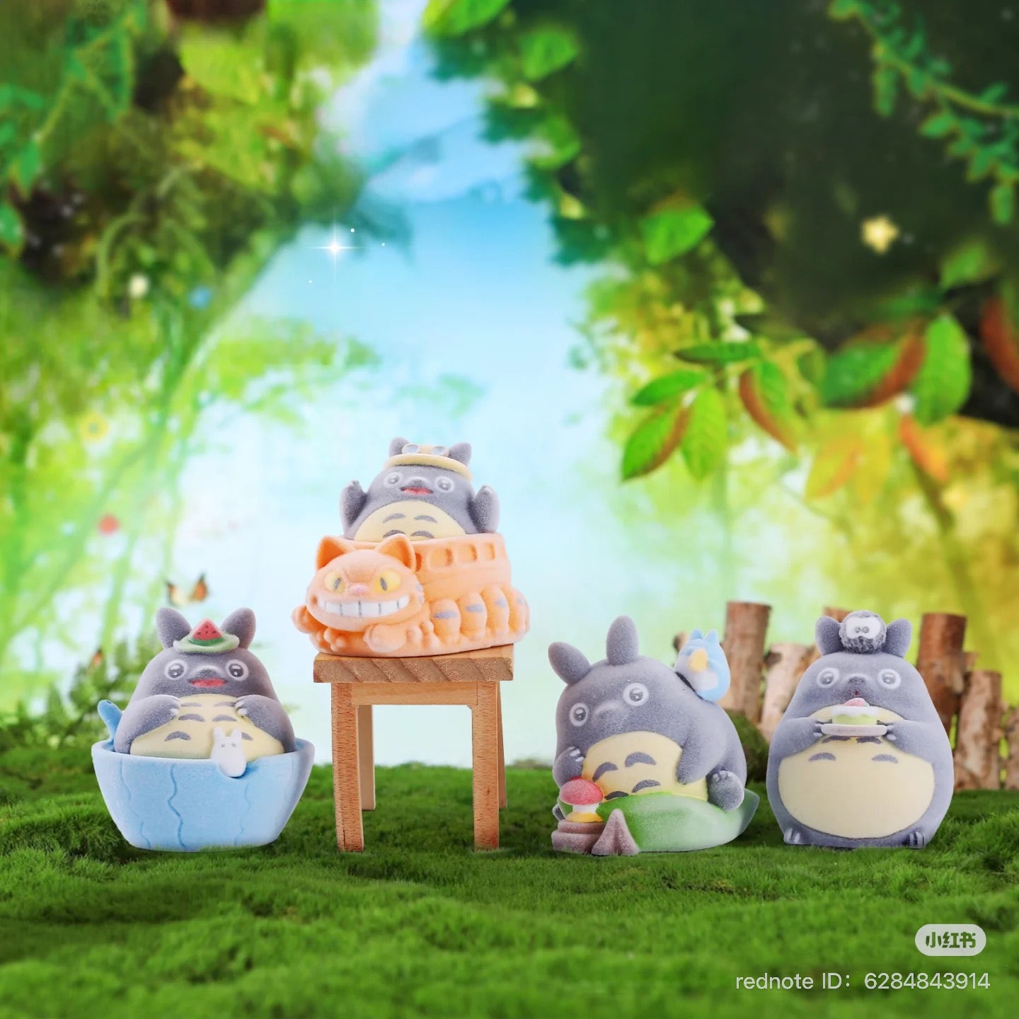 ToToRo Tooth Reading Guardian Hawthorn Silk Blind Box Series toys displayed on grass, featuring various miniature figures and designs.