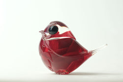 Red Rose Robin by Muffin Man, a detailed red glass bird sculpture with black eyes, crafted from high-grade resin. Limited edition of 48 pieces.