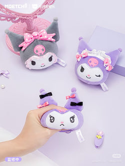 Kuromi Girl's Hair Accessories Series Plush Keychain, shown in a hand, highlighting its compact size and cartoonish design, ideal for art toy enthusiasts.