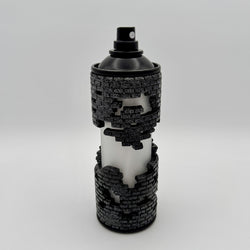 Hello World - BRIX NEBULA CAN by JFO: A black and white spray can featuring a brick design and a white dot on the cap.