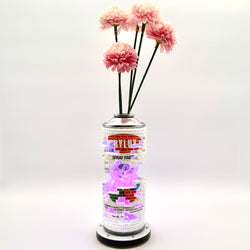 Hello World - BRIX CAN VASE by JFO, features pink flowers in a can, including a power cable and base, suitable for indoor display.