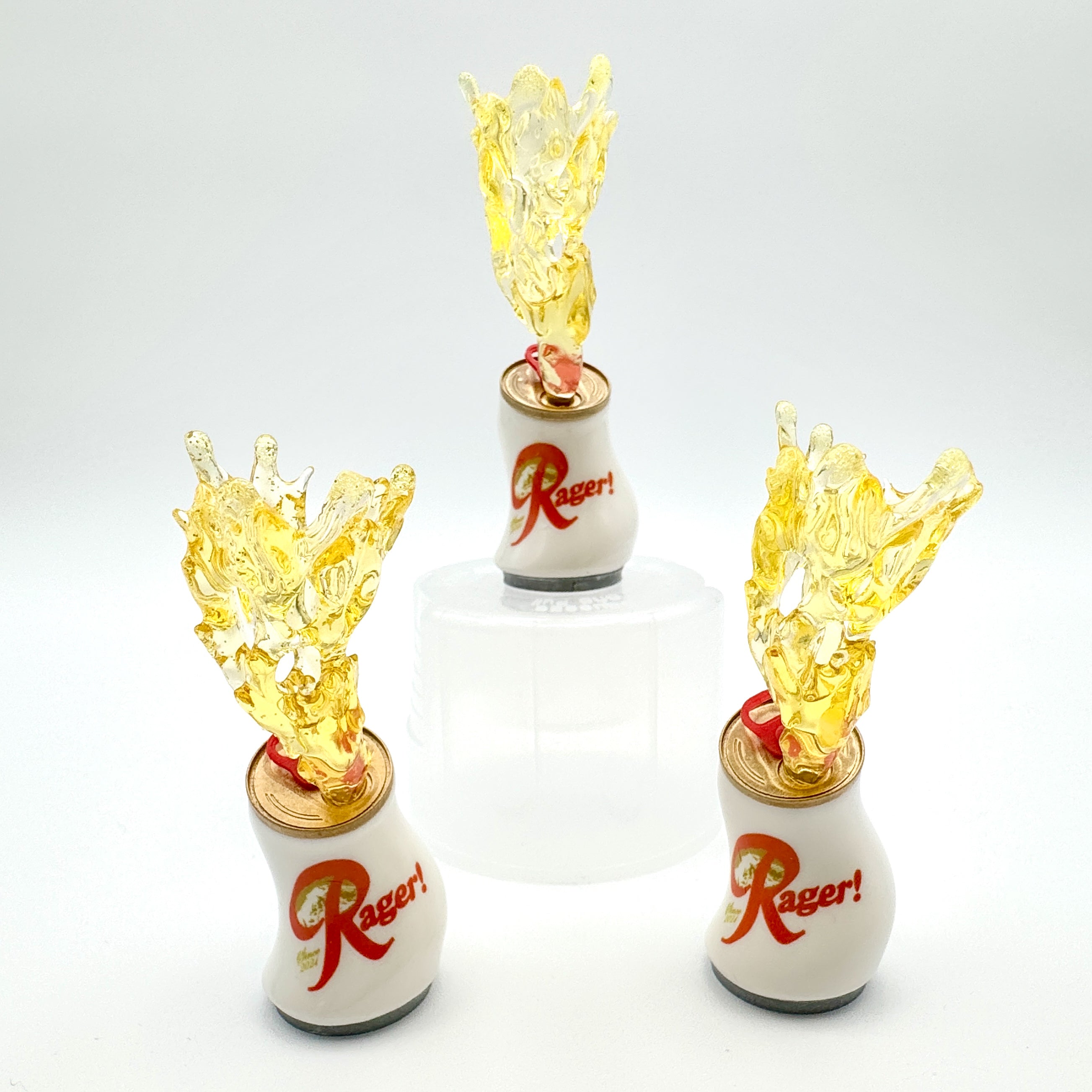 Hello World - RAGER! by JFO, a resin art toy featuring a dynamic composition of white and yellow elements with a distinctive flame motif.