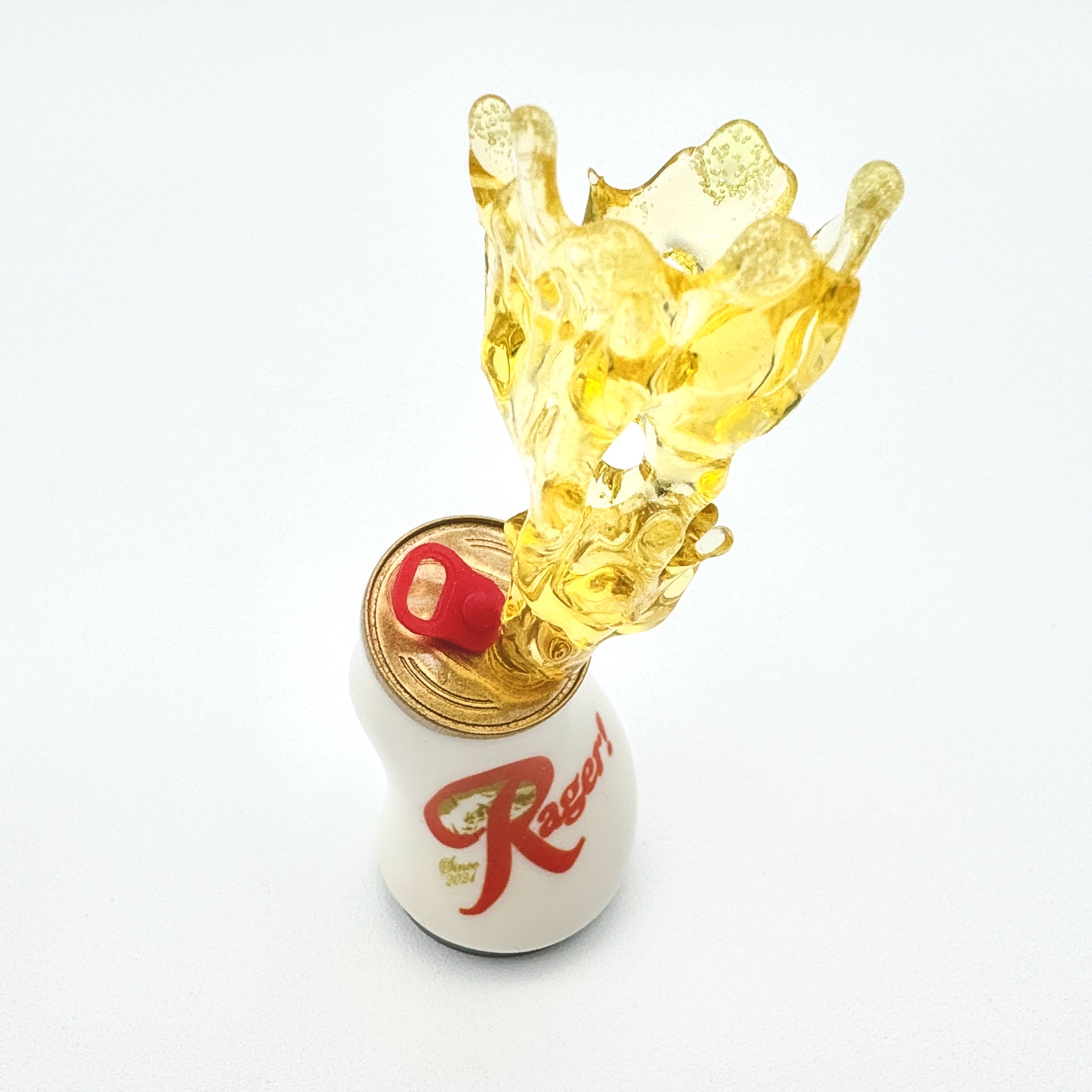 Hello World - RAGER! by JFO, a resin art toy, depicted with yellow liquid dramatically splashing from a white can, featuring a red and white lid.