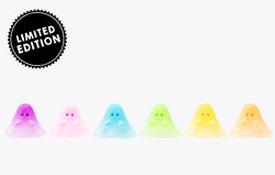 A soft vinyl figure titled JELLY BEANS BOO, featuring colorful ghost designs with varying eye colors. Made in Japan, showcasing clear body with unique drips and bubbles as intentional design elements.