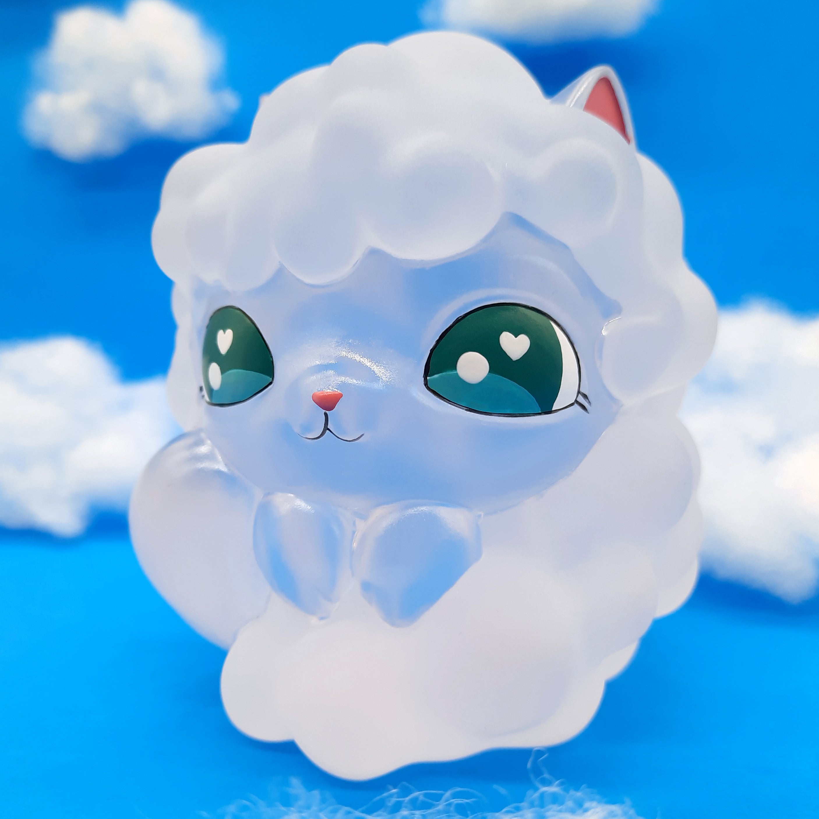 Kumo Kitty, a 4-inch tall high-grade resin toy, depicts a cartoon animal figure with heart details. Limited edition of 50 pieces.