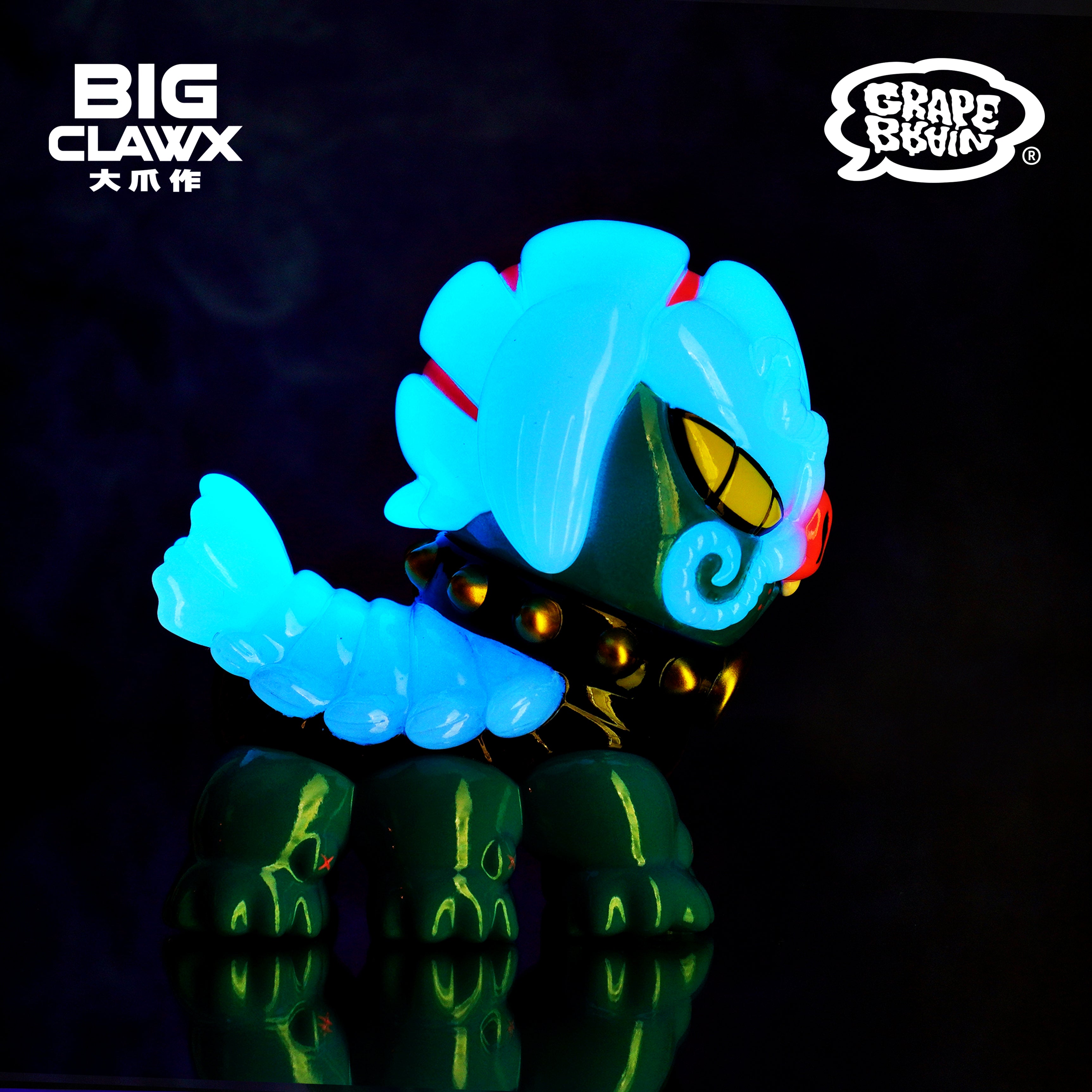 A toy with glowing tail, green skull, and yellow object by BigClaw x Grape Brain.