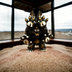 Limited edition DAINIGIRUJIN Black & Gold ver. vinyl statue, 35cm tall. Detailed close-ups of the intricate design.