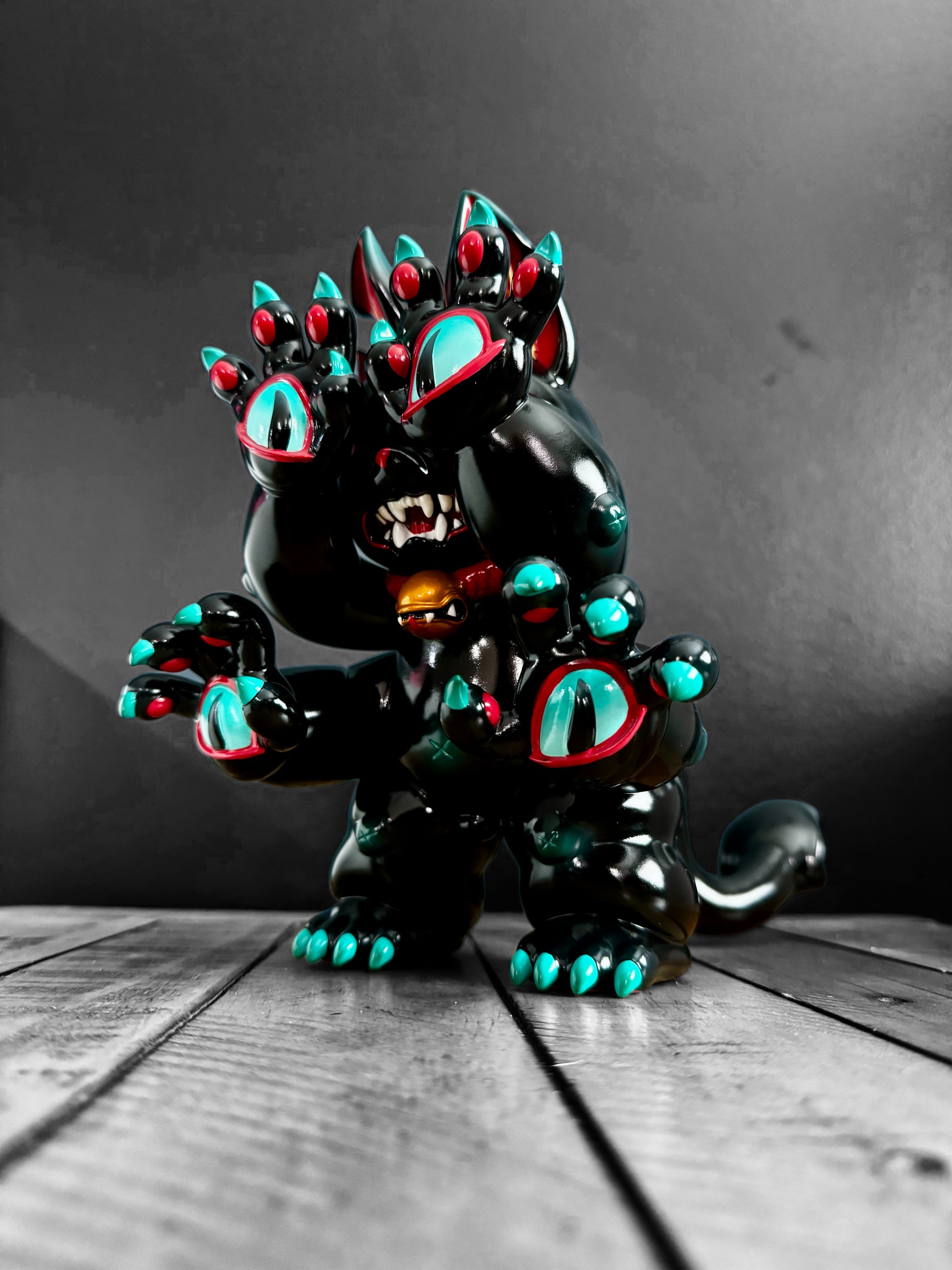 Limited edition DAINIGIRUJIN Black Ver. vinyl toy, 8 tall, 9.5 long. Detailed claws and buttons. From Strangecat Toys, a blind box and art toy store.
