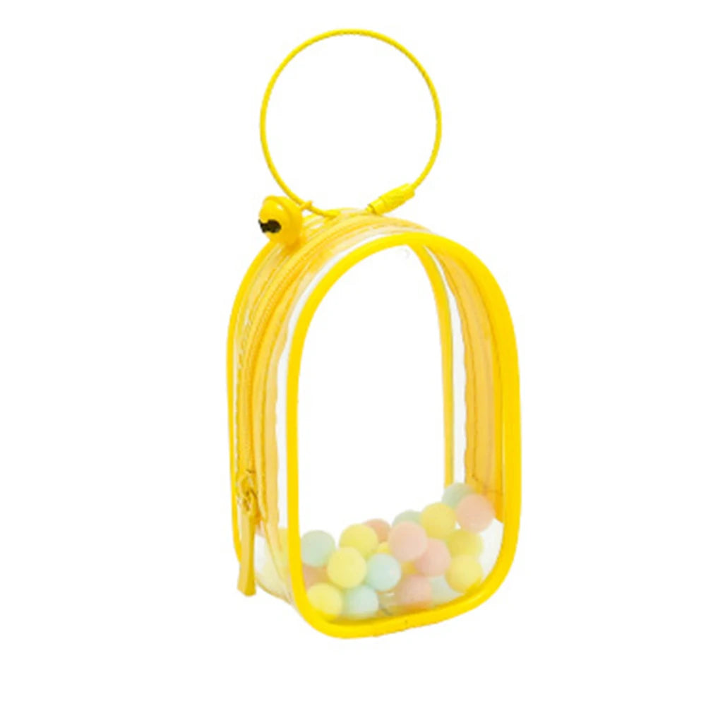 Toy Pochette Keychain: Yellow transparent bag with yellow handle, small round balls inside, bell, and keyring. Ideal for displaying dolls.