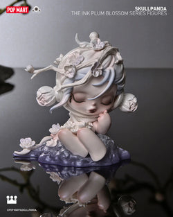 A statue of a girl with flowers on her head from SKULLPANDA The Ink Plum Blossom Blind Box Series.