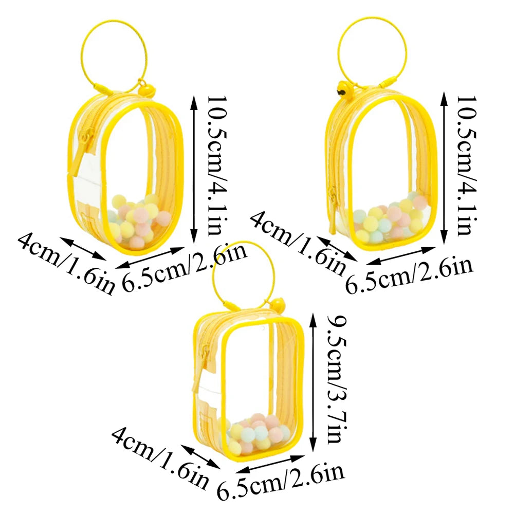 Toy Pochette Keychain with transparent yellow PVC bag, featuring bells, rings, and hairballs, designed for displaying dolls.