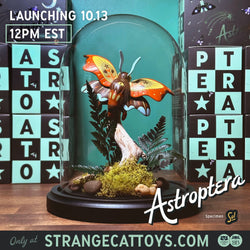 Astroptera - Sol by Stephanie Buscema, a butterfly statue in a glass dome.