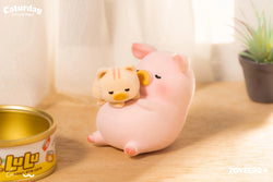 A toy pig and cat cuddling in a can, part of LuLu The Piggy - Warm Time With Kitty set.