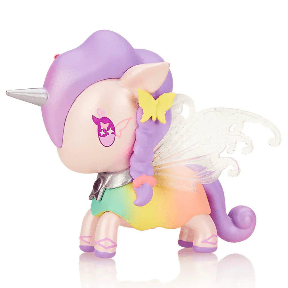 A blind box and art toy store's limited edition Tokidoki Butterfly Fairy figure, featuring a unicorn with wings and a rainbow dress, accompanied by a sticker sheet.