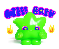 Weee baby - Preorder: Green animal figure toy with eyes, star, and letters.
