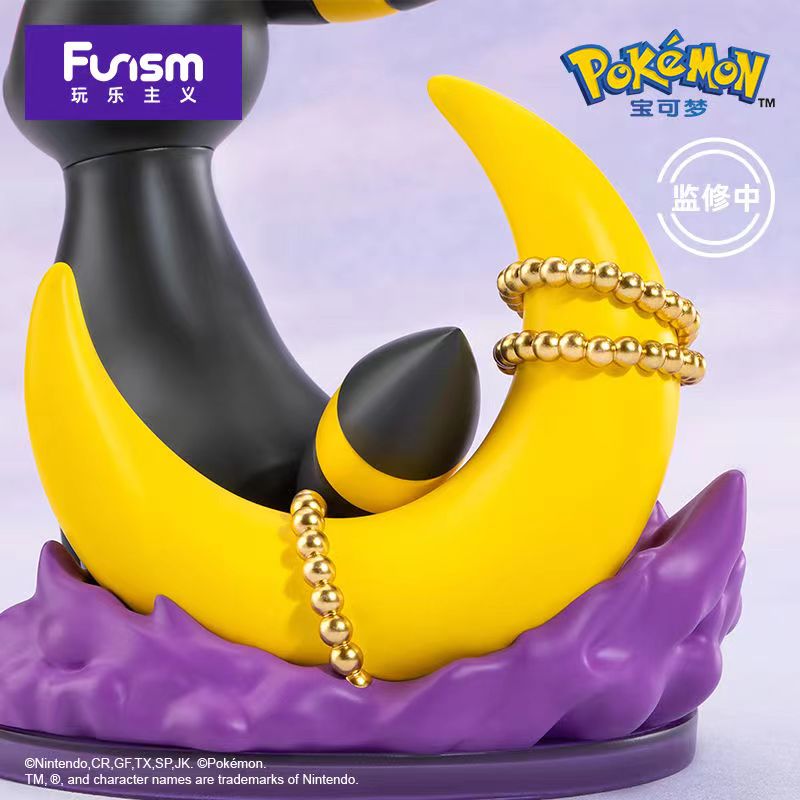 Pokémon Umbreon figurine, 5-inch PVC/ABS toy, depicting a cartoon character with detailed design.