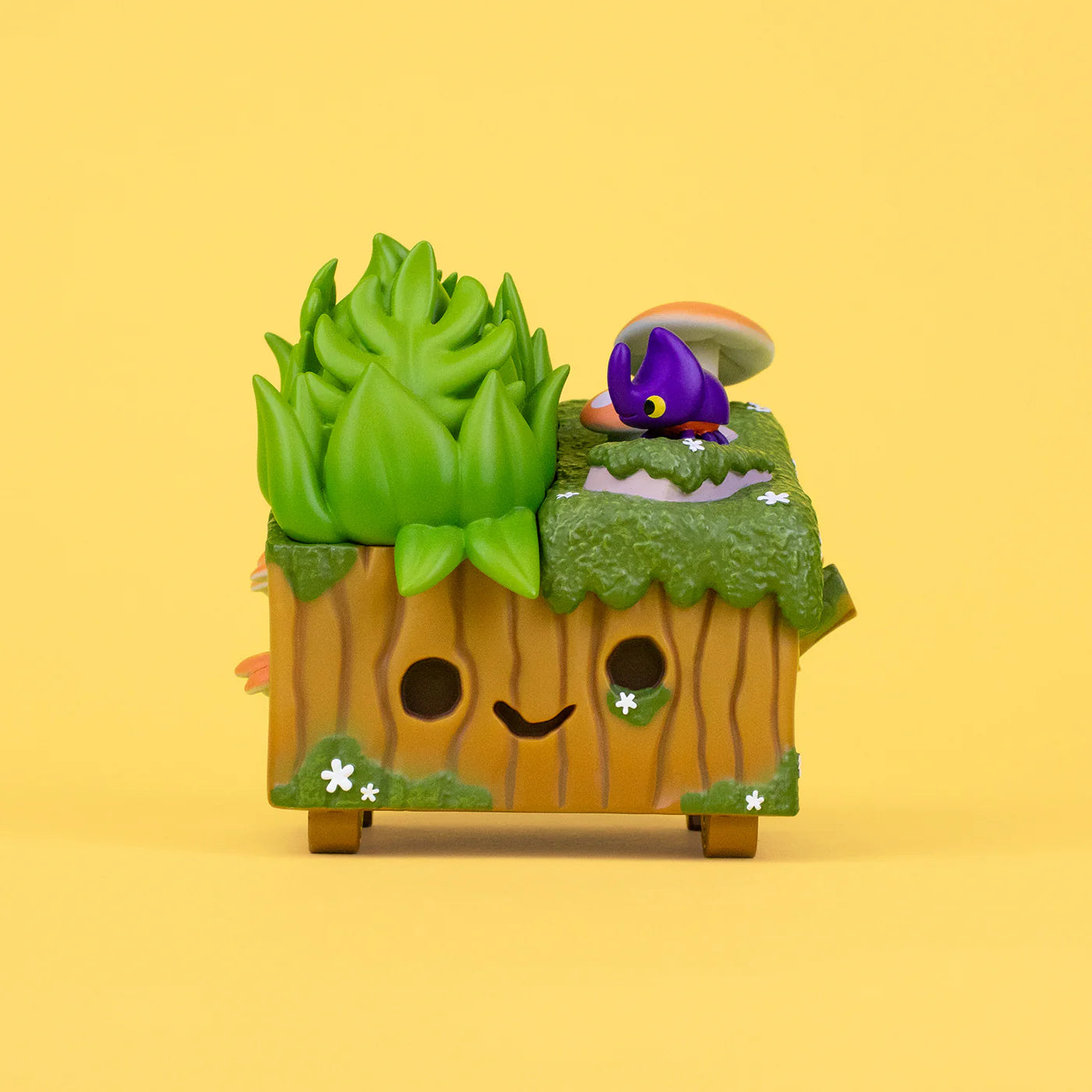 New Dumpster Stump Vinyl Figure: a whimsical toy planter featuring a cartoon character with a waffle cone body and textured melted ice cream covering.