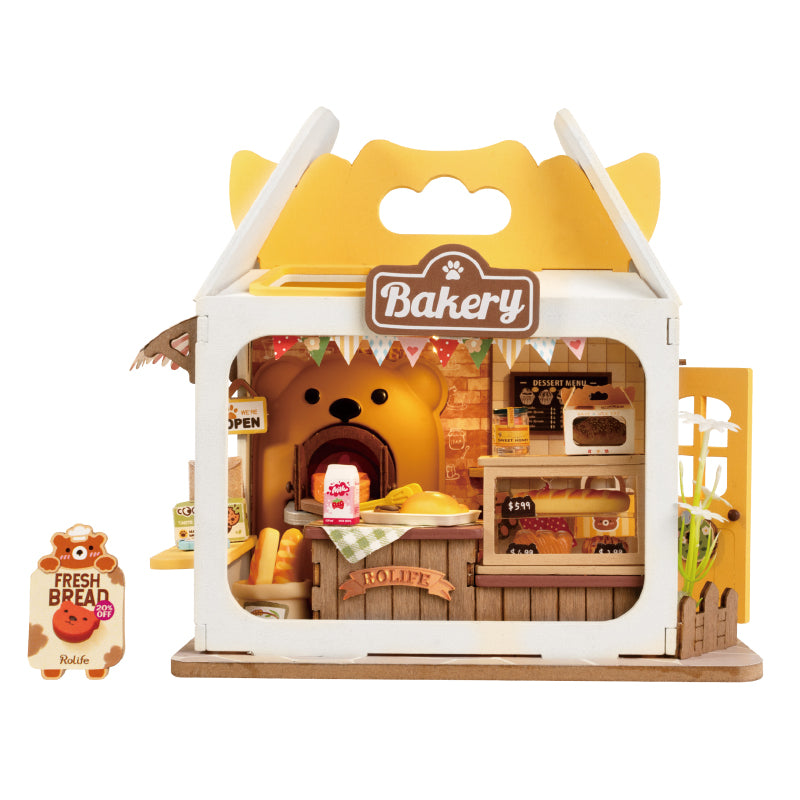 Teddy’s Breadbox Diy Miniature House: A toy bakery with a bear face and bear-themed details, including a bear oven and bakery sign.