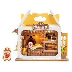 Teddy’s Breadbox Diy Miniature House: A toy bakery with a bear face and bear-themed details, including a bear oven and bakery sign.