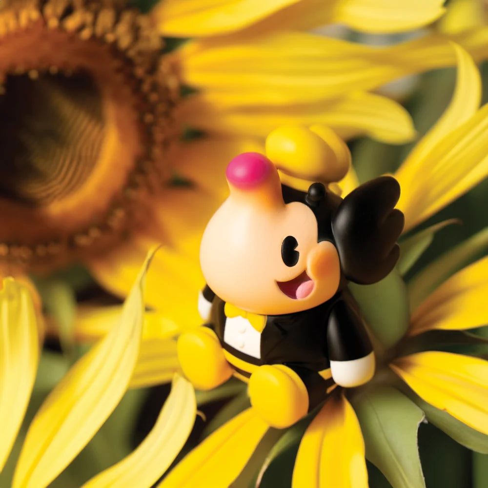 BUMBLE BEE ELFIE by Too Natthapong, a 3-inch soft vinyl toy, depicted atop a sunflower, preorder for July 2024.