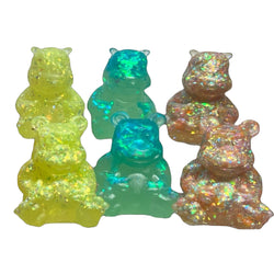 High Spirits - Gumbearto and Hippie Pam Baby Sets by Fett Up Toys, 2.75-inch solid resin figures, featuring colorful, glittery toy animals.