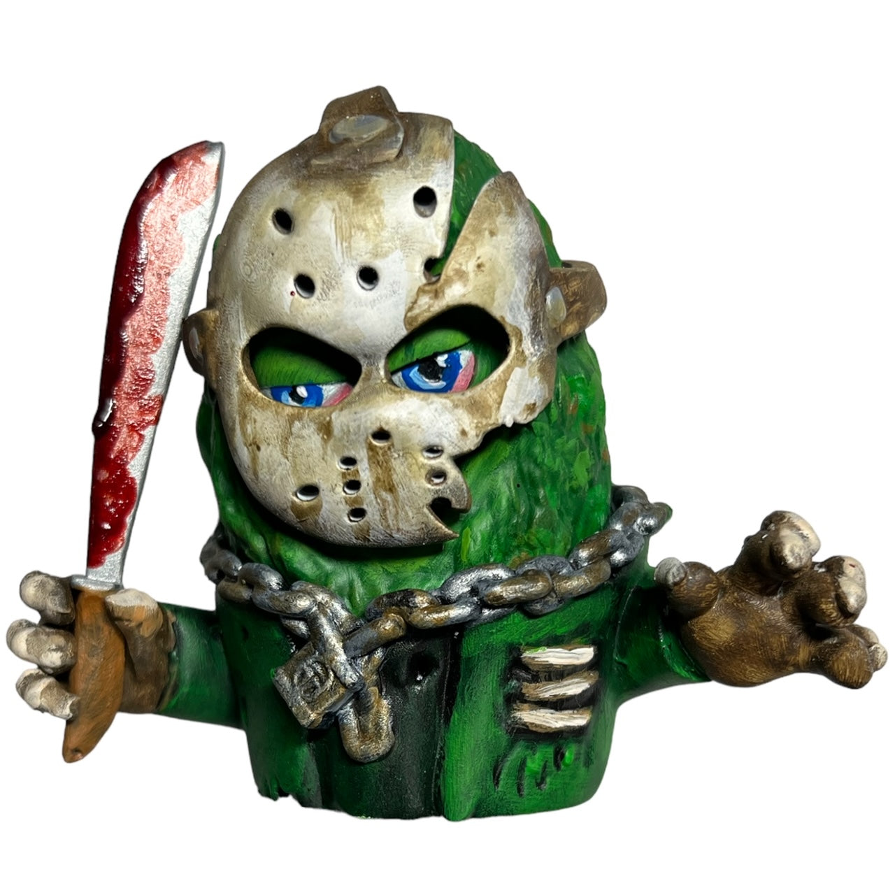 High Spirits - Mega Horror Nugs Jason Nugheez by Fett Up Toys: a 3.5-inch green monster figurine with a mask and bloody knife, made of solid 3D tuff resin.