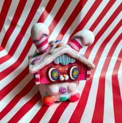 Ngaew & Friends - Ginger Candy House by Rato Kim, a small ceramic house with striped details and a yellow star.