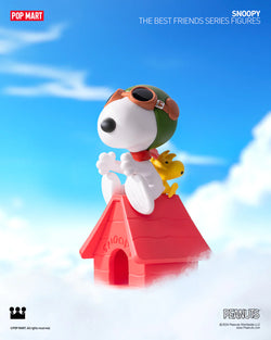 Snoopy The Best Friends Blind Box Series - Preorder: Toy dog and duck figurines on a doghouse with a cartoon dog wearing goggles.