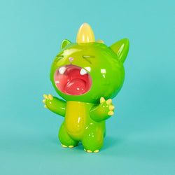 New Screaming Boomu Kaiju Kitty Soft Vinyl Figure, featuring a glossy green finish, yellow horn, and open-mouthed roar, standing at 7 inches tall.