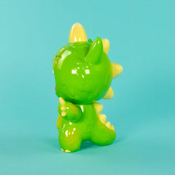 New Screaming Boomu Kaiju Kitty Soft Vinyl Figure, a 7-inch tall green and yellow toy with a glossy finish and open-mouthed roar.