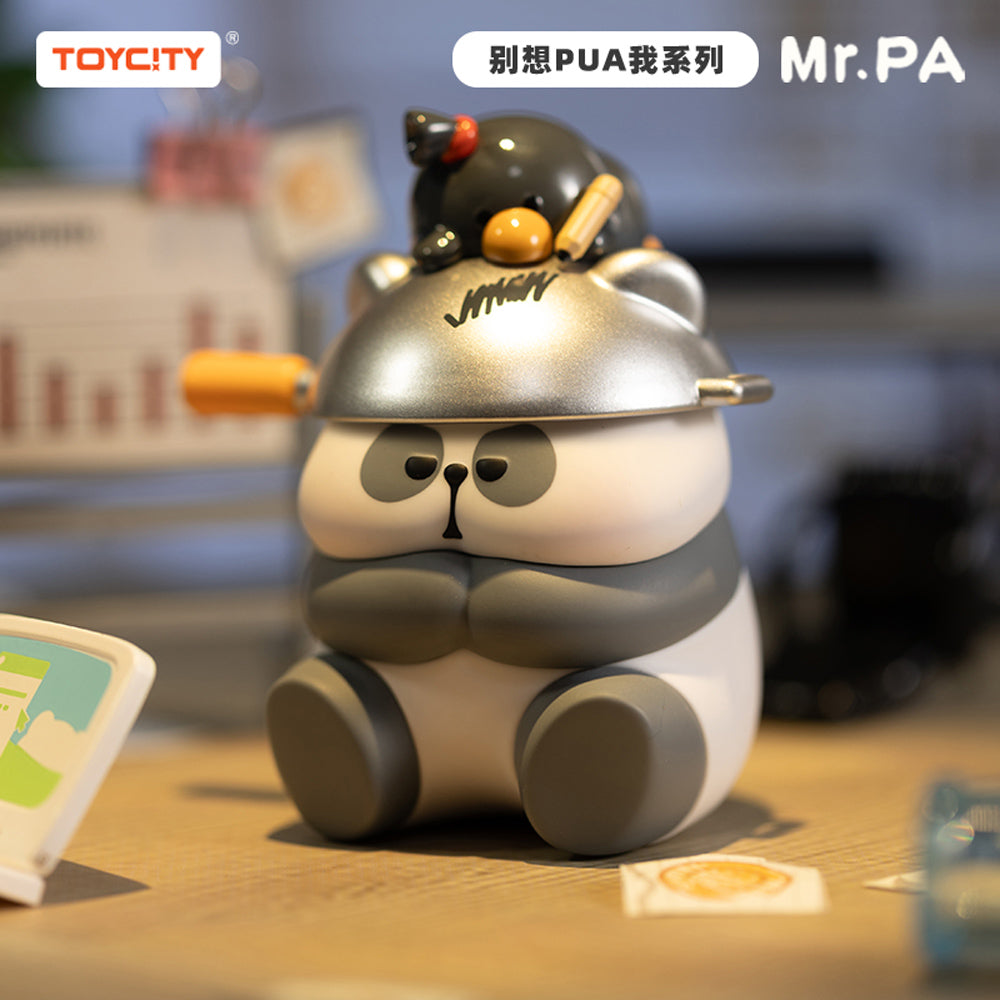 A toy panda and a black chicken on a desk, part of Mr PA Don't Try To Pua Me Blind Box Series from Strangecat Toys. Preorder for June 2024.