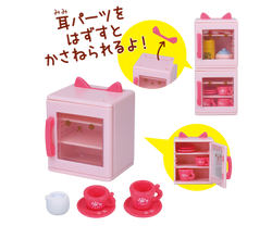 Kitty Kitchen DX10 Gacha Series features a toy kitchen set with an open door, glass door, and a pink toy box with a cat face.