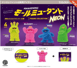 A group of colorful toys: pink stuffed animal, pink puppet, green puppet with pink tongue.