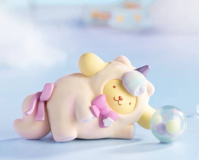 A blind box series featuring Sanrio Characters - Fantasy Paradise. Includes toy animals with a ball, unicorn, and a clear ball with colorful balls inside. Purchase a case for all 8 designs.