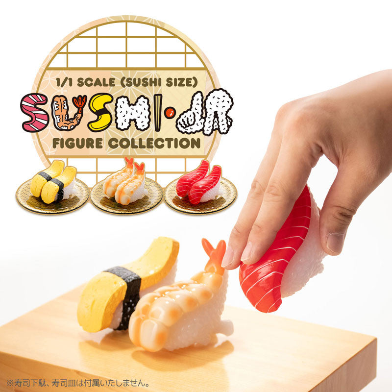 Hand holding a sushi figurine from the Sushi Kaiju Sushi LA Real Sushi-Size Figure Collection, part of a series with five designs and one secret.