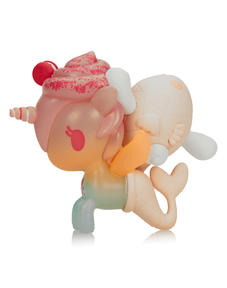 Tokidoki X Cinnamoroll Sweet Treats Cinnamoroll X Mango'licious toy figure, featuring a whimsical unicorn design, reflecting the playful essence of collectible art toys.