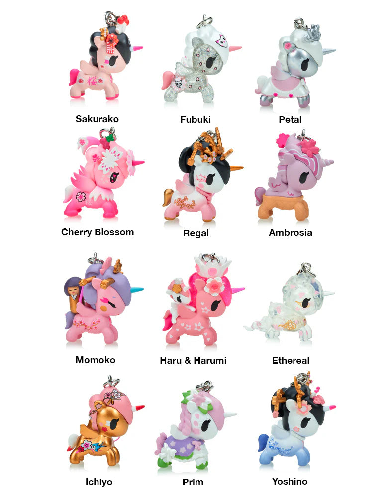 Cherry Blossom Unicorno Frenzies Blind Box featuring various unicorn-themed keychains, perfect for art toy collectors and fans of springtime cherry blossoms.